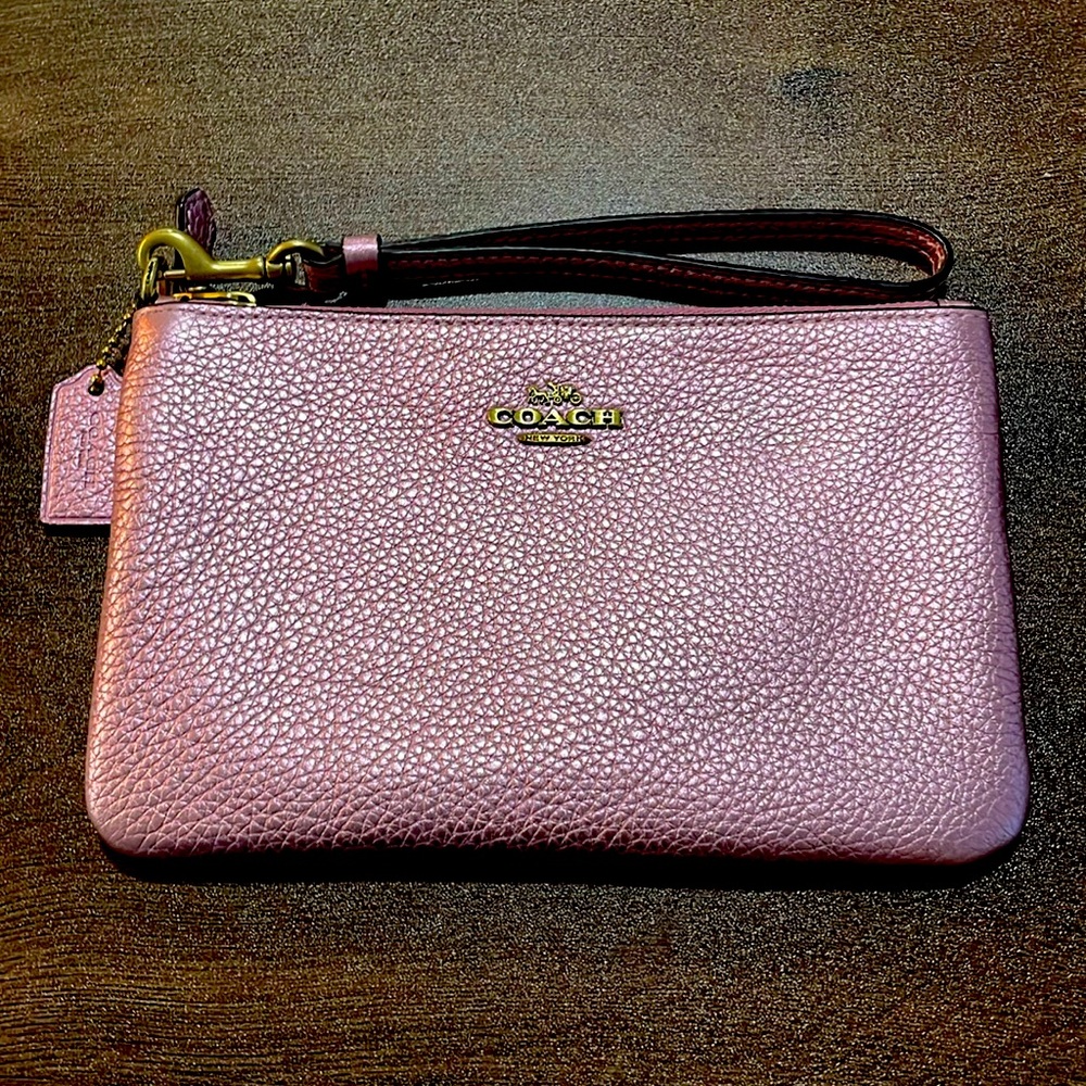 Coach wristlet in metallic pink